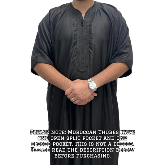 Black Moroccan Gandoura Thobe, front view with hands clasped.