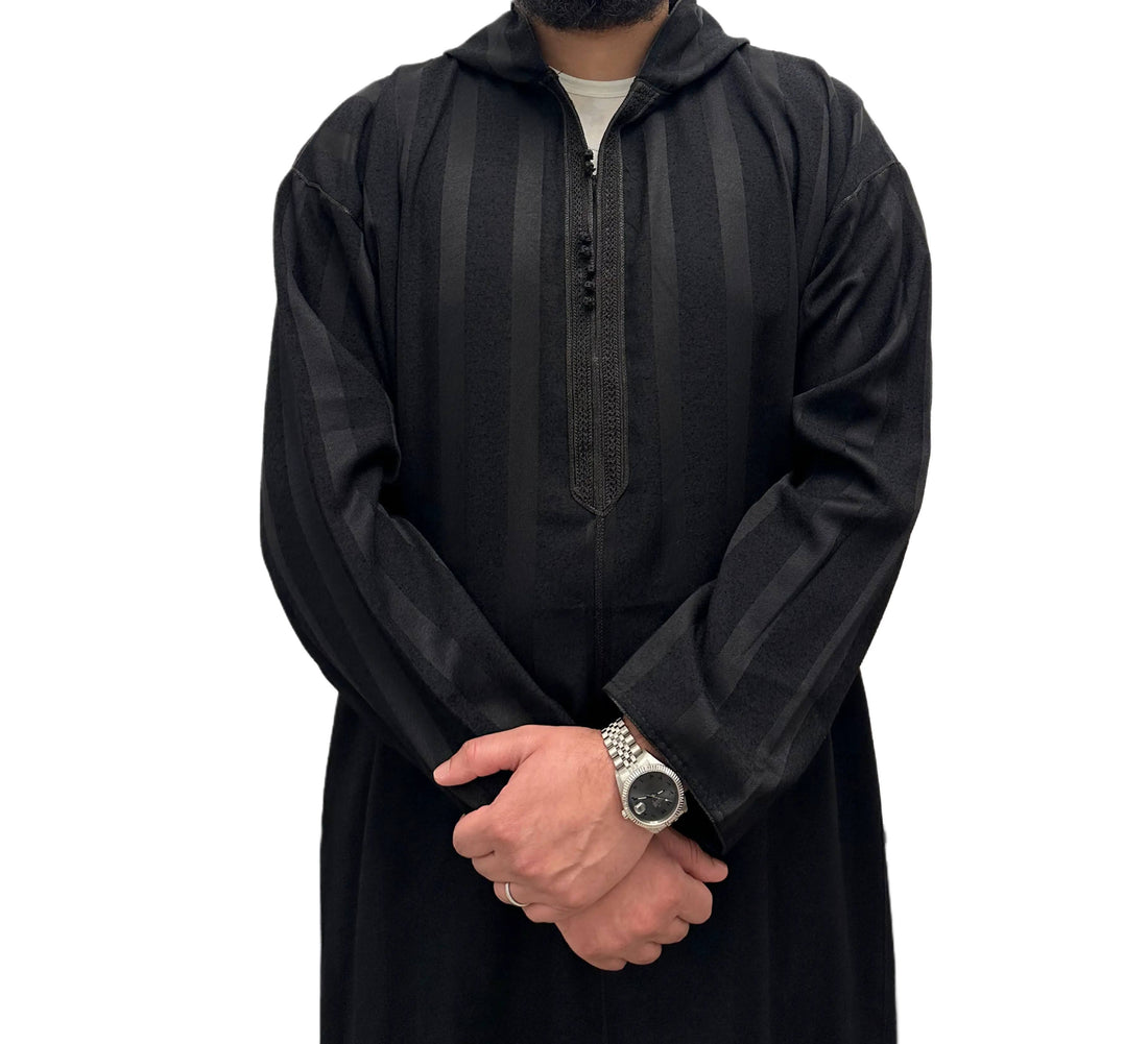 Hooded Moroccan djellaba, front view in black with dark vertical stripes.